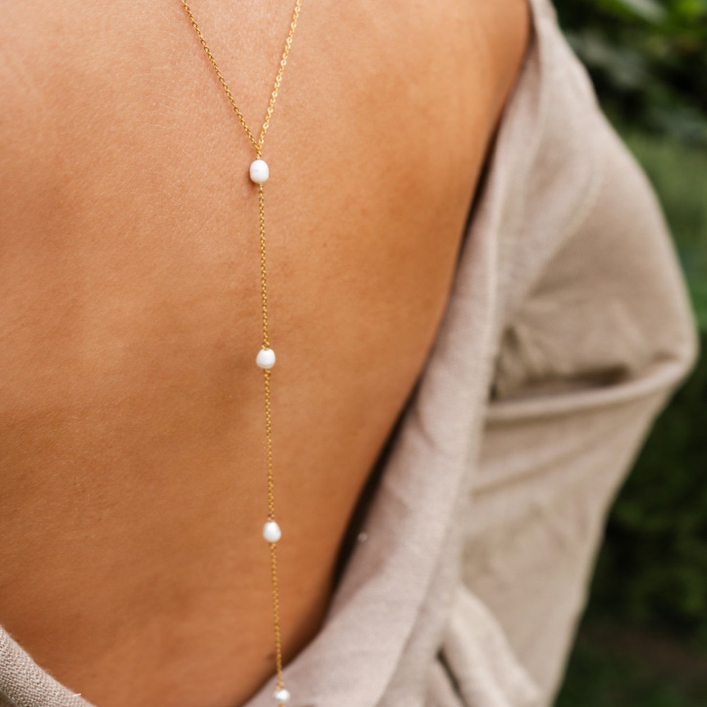 COLLANA PENDENTE SCHIENA CON PIETRE